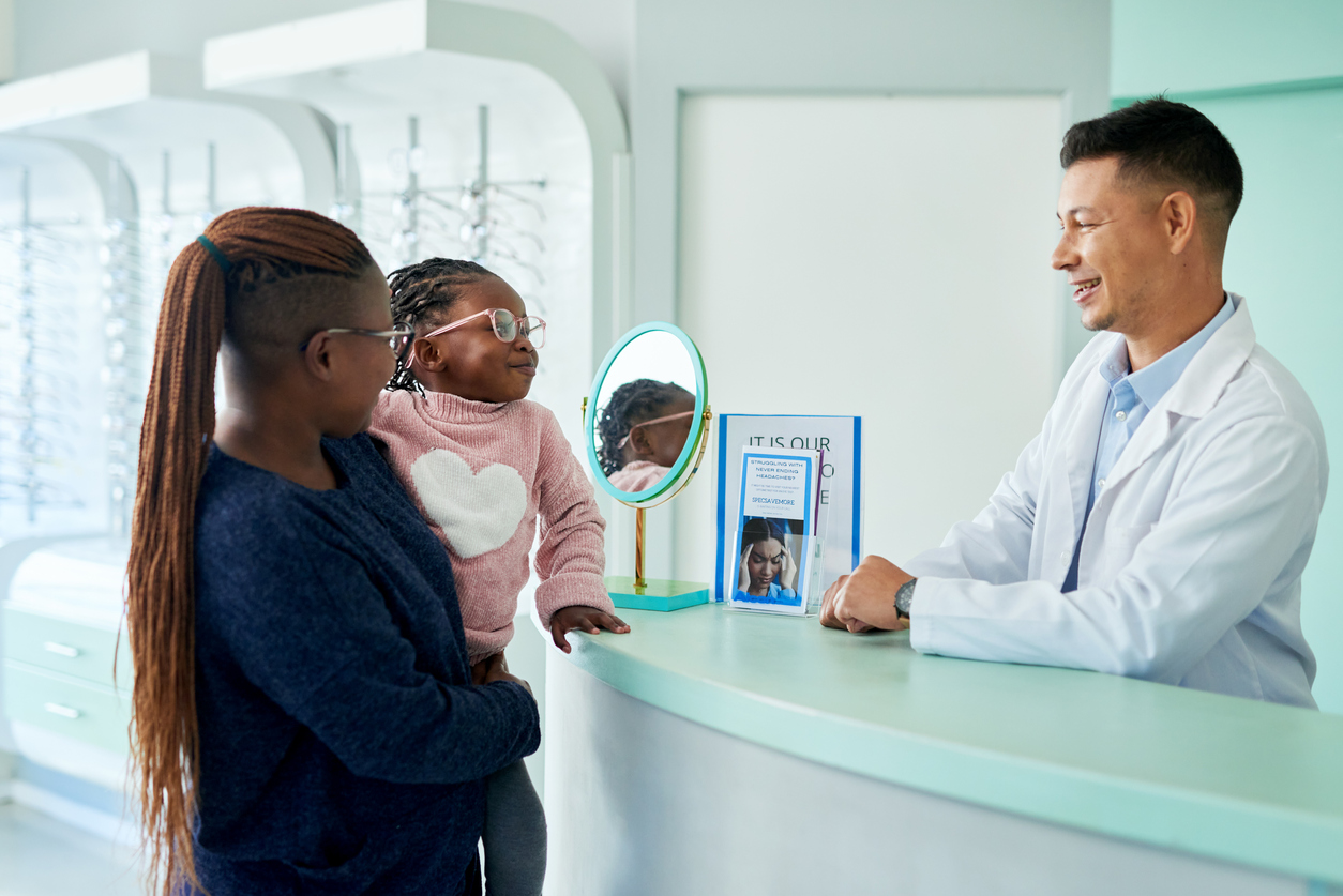 Kids, parent and optometrist, glasses and vision doctor, optometry and consulting in retail clinic store.
