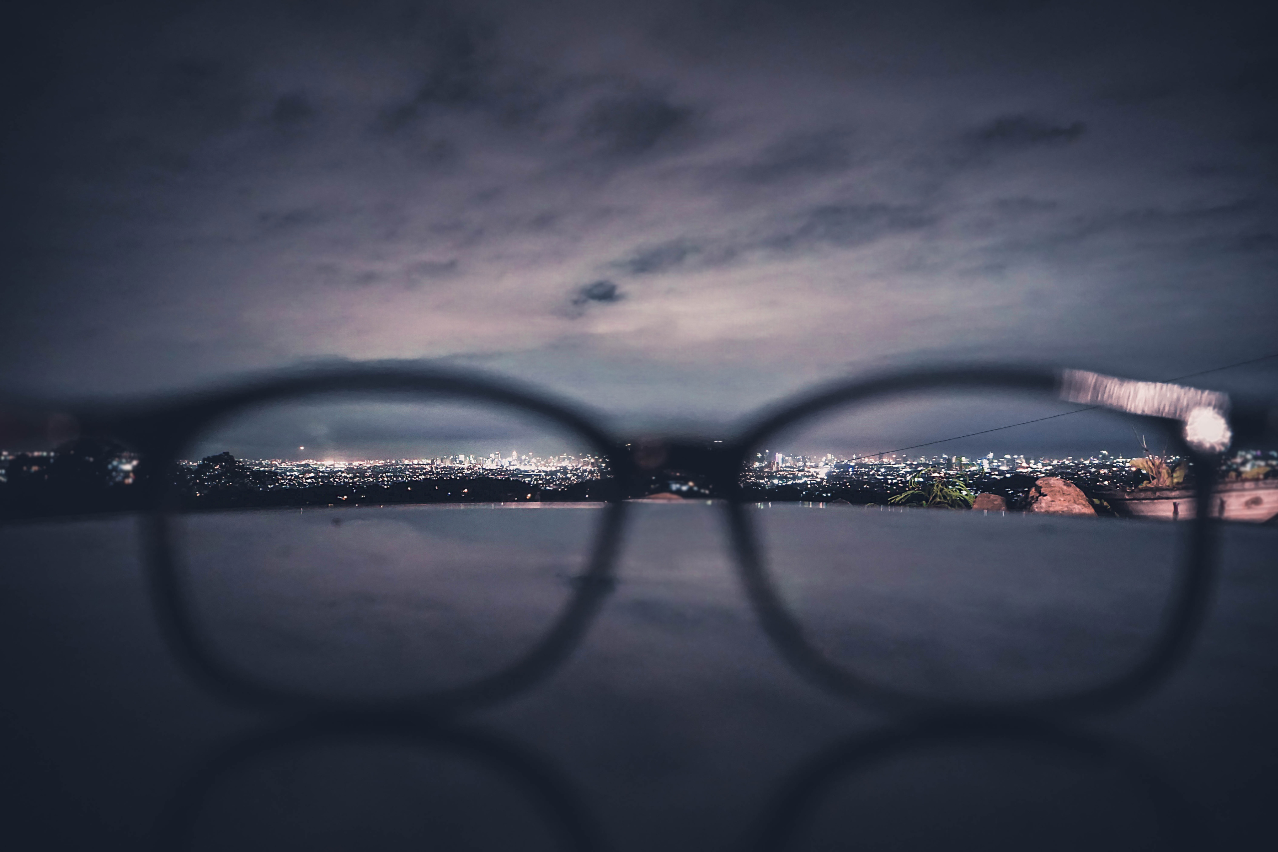 night view through eyeglasses blurred